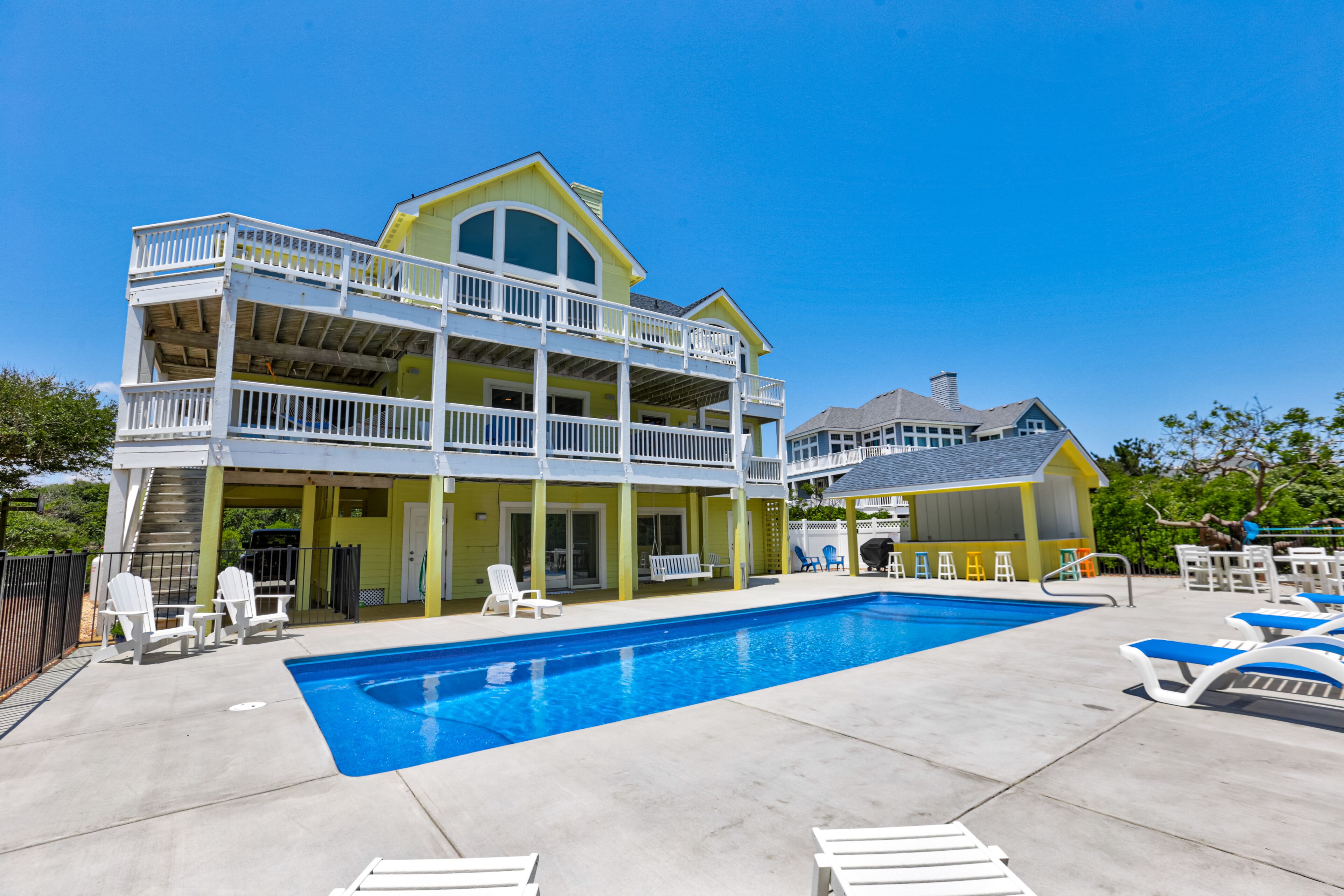 Cheerful semi-oceanfront Corolla home w/ private pool, hot tub, & gas fireplace