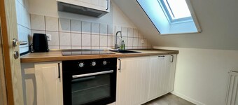 Vacation apartment "Leuchtturm" with large garden in the heart of Pilsum