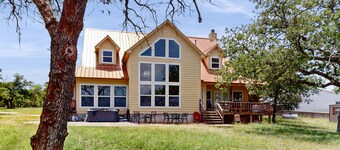 Waterfront home with kayak, view, fire pit & WiFi - dog-friendly