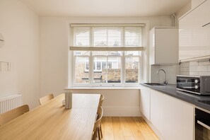 Luxury Suite, 2 Bedrooms, Terrace | Living area | 32-inch flat-screen TV with digital channels, TV, Netflix
