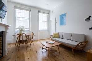 Luxury Suite, 1 Bedroom | Living area | 32-inch flat-screen TV with digital channels, TV, Netflix - Hausd - Floral Street (London)