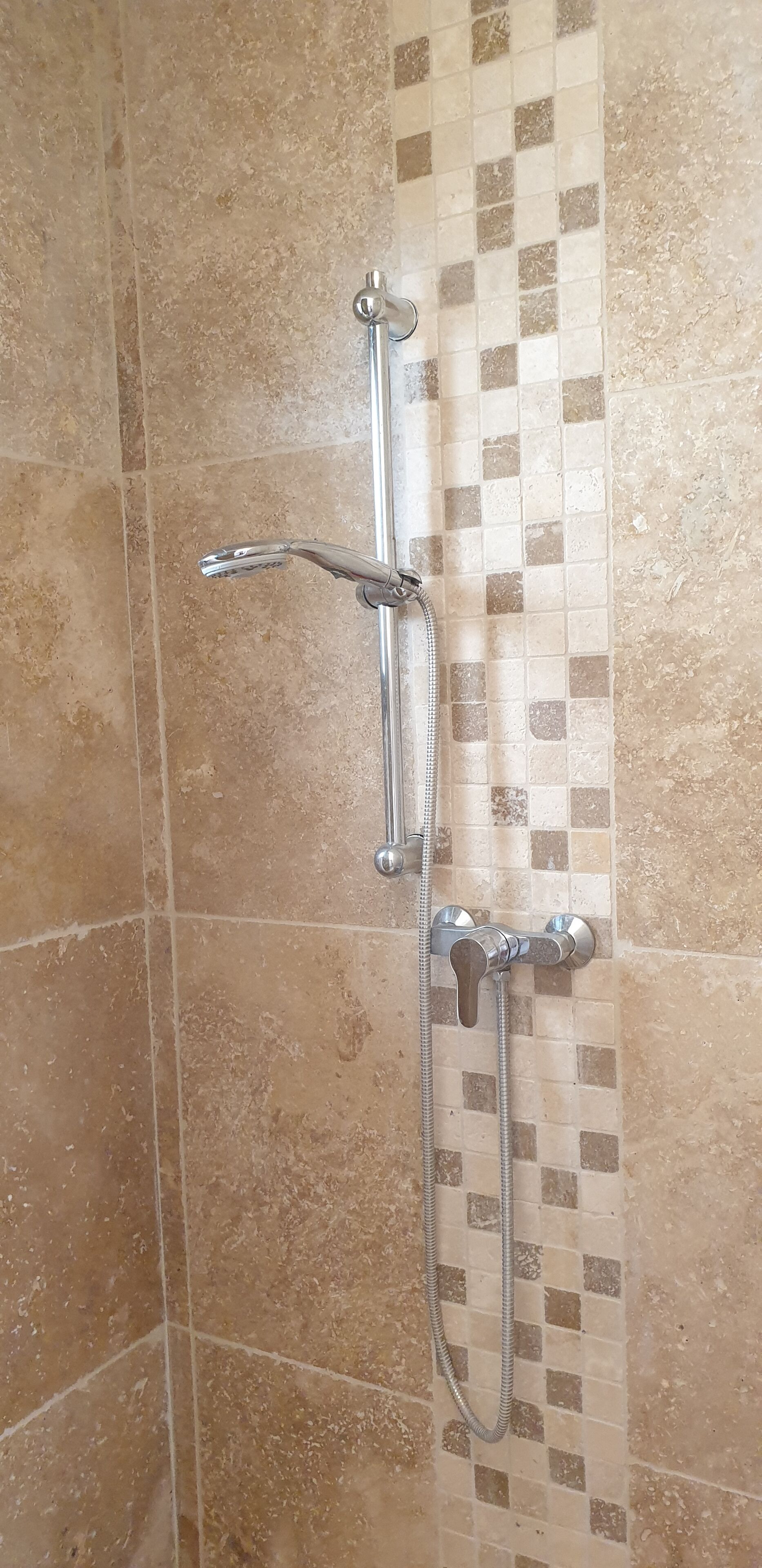 Een douche, handdoeken