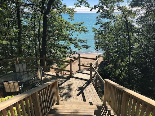 House is located on Lake Huron with a private beach