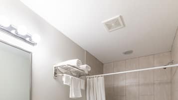 Combined shower/bathtub, hair dryer, towels, soap