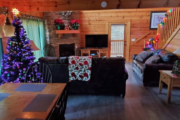 The living room, decked out for Christmas! We decorate in November!