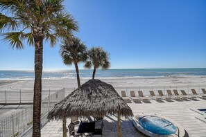On the beach, sun loungers, beach towels