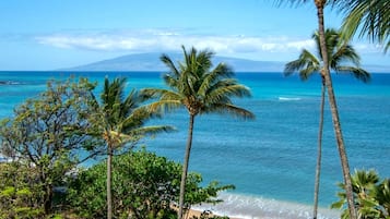 On the beach, sun-loungers, beach towels