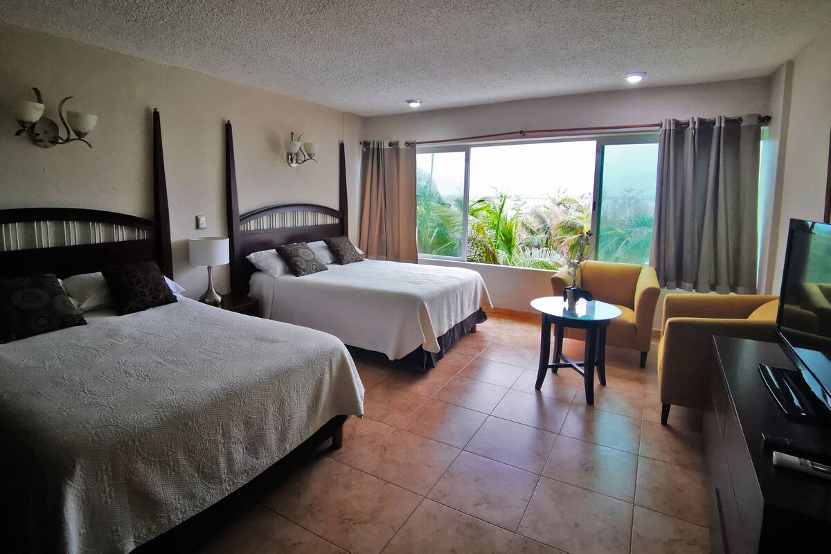 Family Apartment, Partial Ocean View | 1 bedroom, in-room safe, WiFi (free), bed sheets