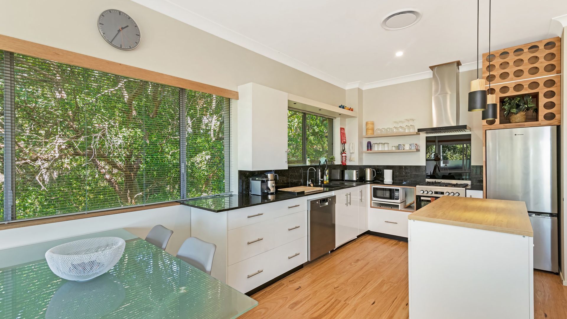 8/24 Panorama Drive - Modern unit set amongst the trees with beach views