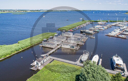 Lovely ship in Aalsmeer with lake view