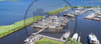 Lovely ship in Aalsmeer with lake view