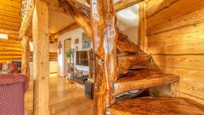 A wooden staircase with a rustic design, leading to a lower level. - Amazing home in Sveti Rok (Sveti Rok)