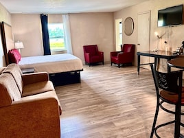Suite, 1 cama de matrimonio grande con sofá cama, no fumadores | Escritorio, espacio para trabajar con un portátil, cortinas opacas