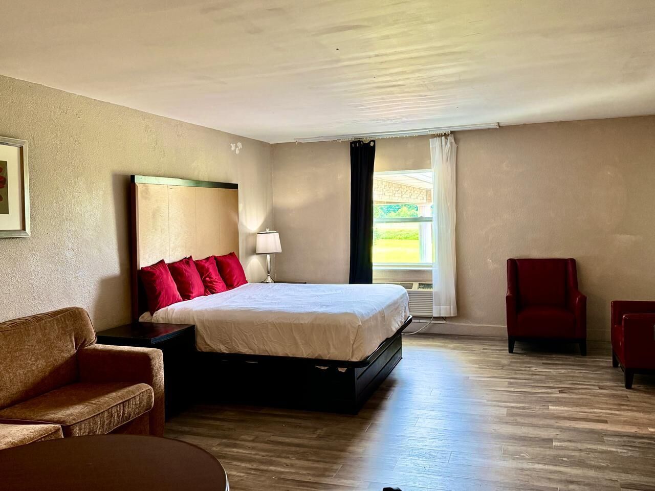 Suite, 1 King Bed with Sofa bed, Non Smoking | Desk, laptop workspace, blackout drapes, iron/ironing board