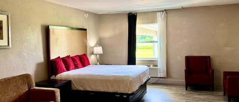 Suite, 1 King Bed with Sofa bed, Non Smoking | Desk, laptop workspace, blackout drapes, iron/ironing board