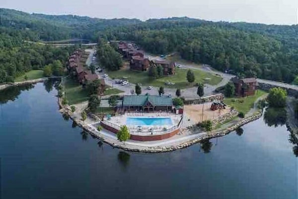 Aerial view of the main pool and catch and release lake - walking distance from the cabin!
