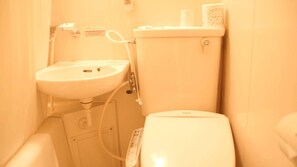 A bathroom with a white sink and toilet. - Business Hotel Chateau Est Takamatsu (Takamatsu)