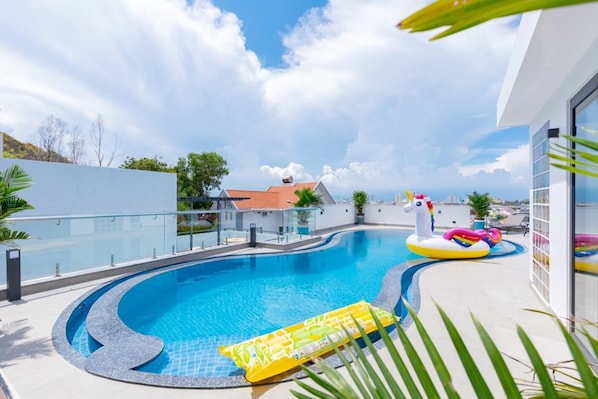 Outdoor pool, sun loungers