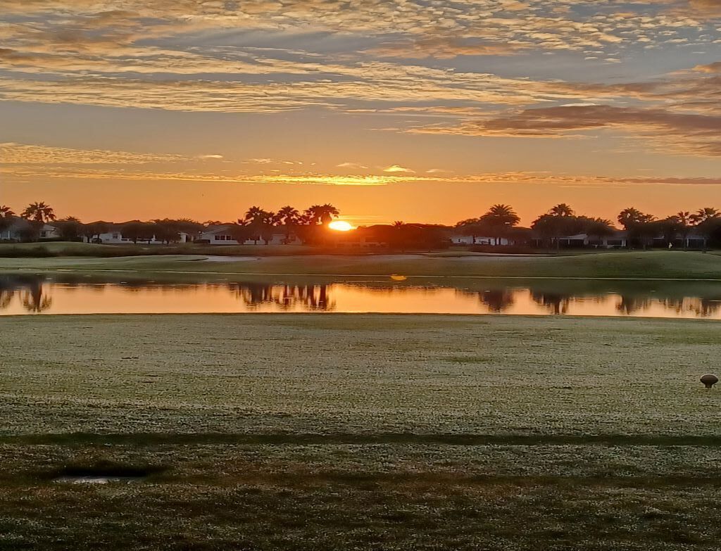 Sunrise over Turtle Mound Executive GC.  A 7-minute cart ride.