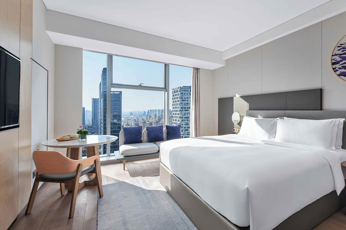 Premium bedding, down duvets, pillow-top beds, free minibar