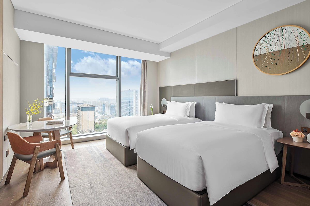 Premium bedding, down duvets, pillow-top beds, free minibar