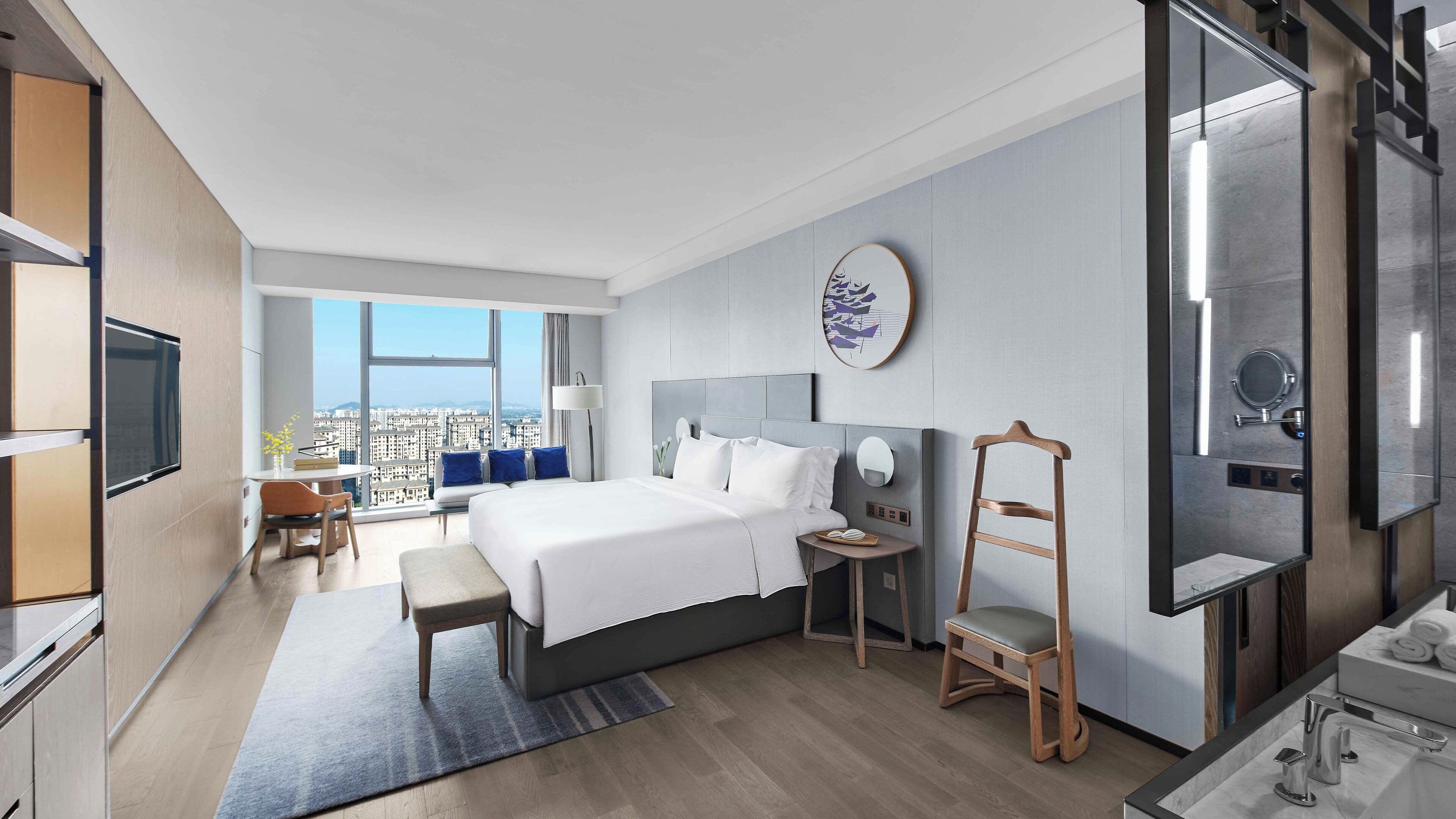 Premium bedding, down comforters, pillowtop beds, free minibar