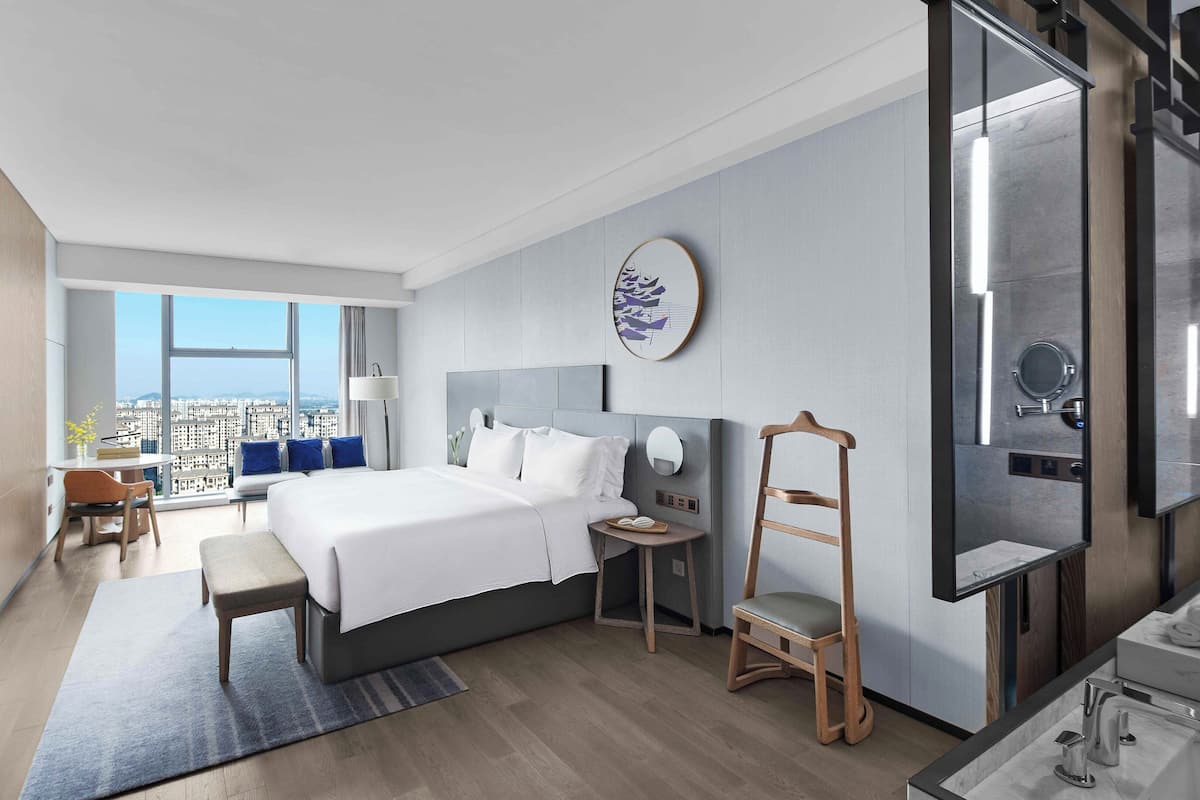 Premium bedding, down duvets, pillow-top beds, free minibar