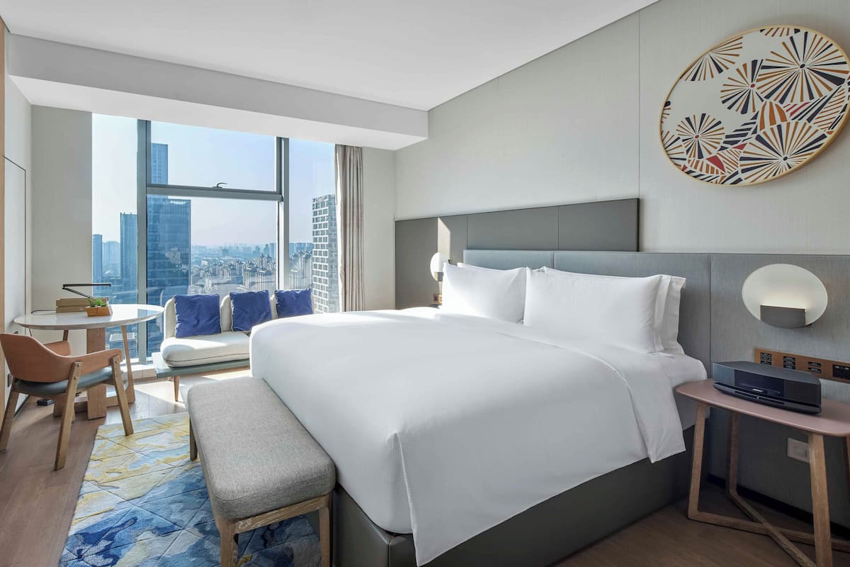 Premium bedding, down duvets, pillow-top beds, free minibar