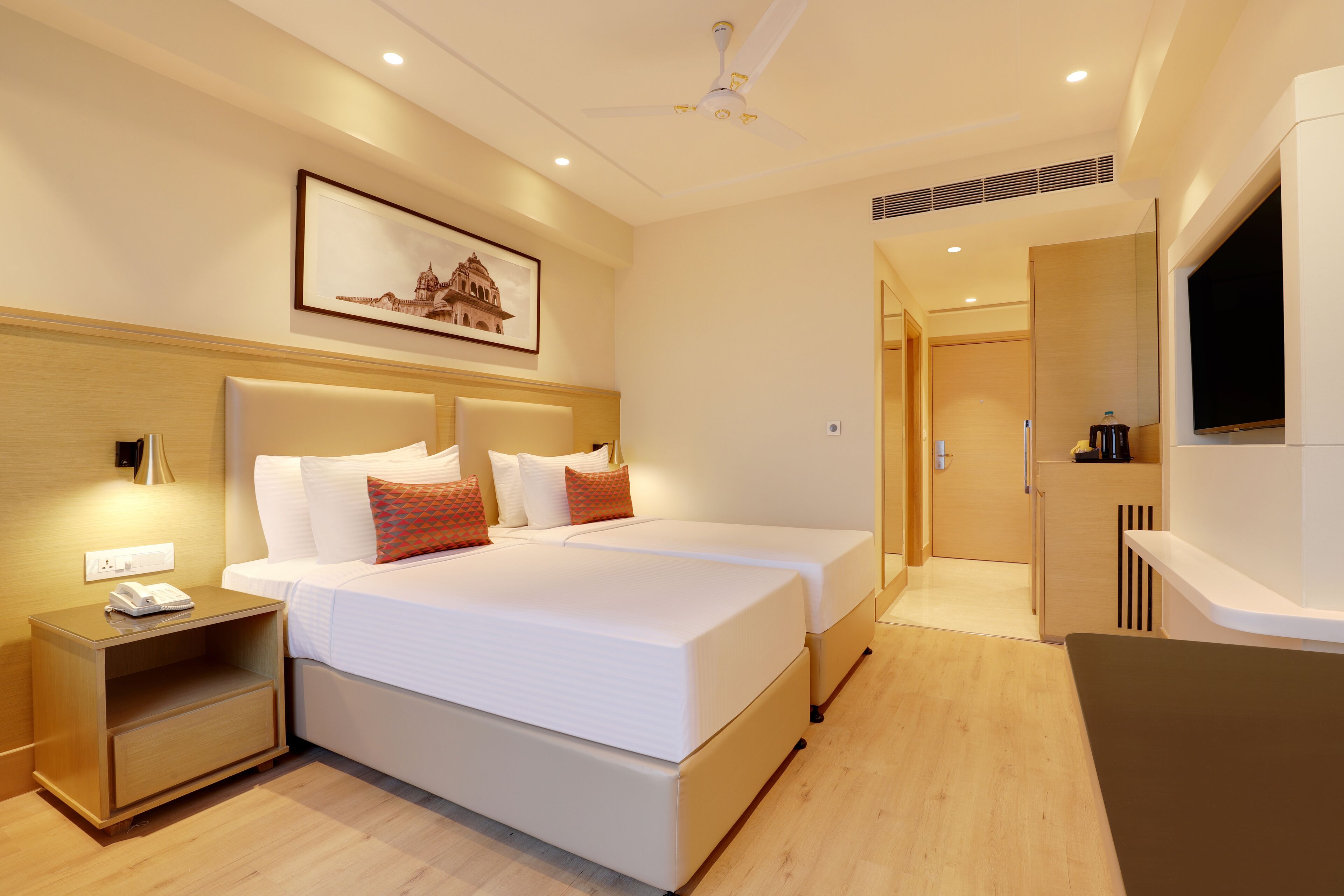 Deluxe Twin Room | Minibar, in-room safe, iron/ironing board, rollaway beds