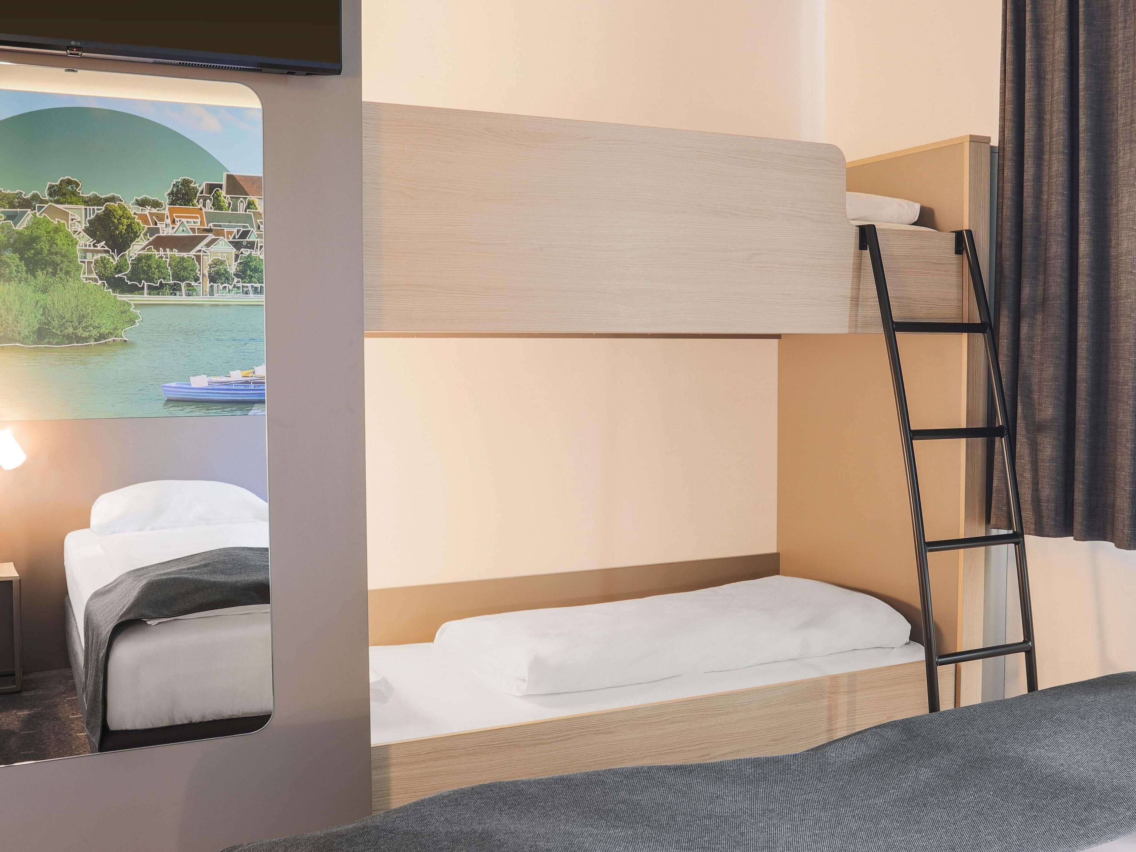 Chambre familiale | Literie hypoallergénique, bureau, système d’insonorisation