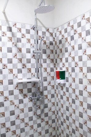 Shower, slippers, towels, soap