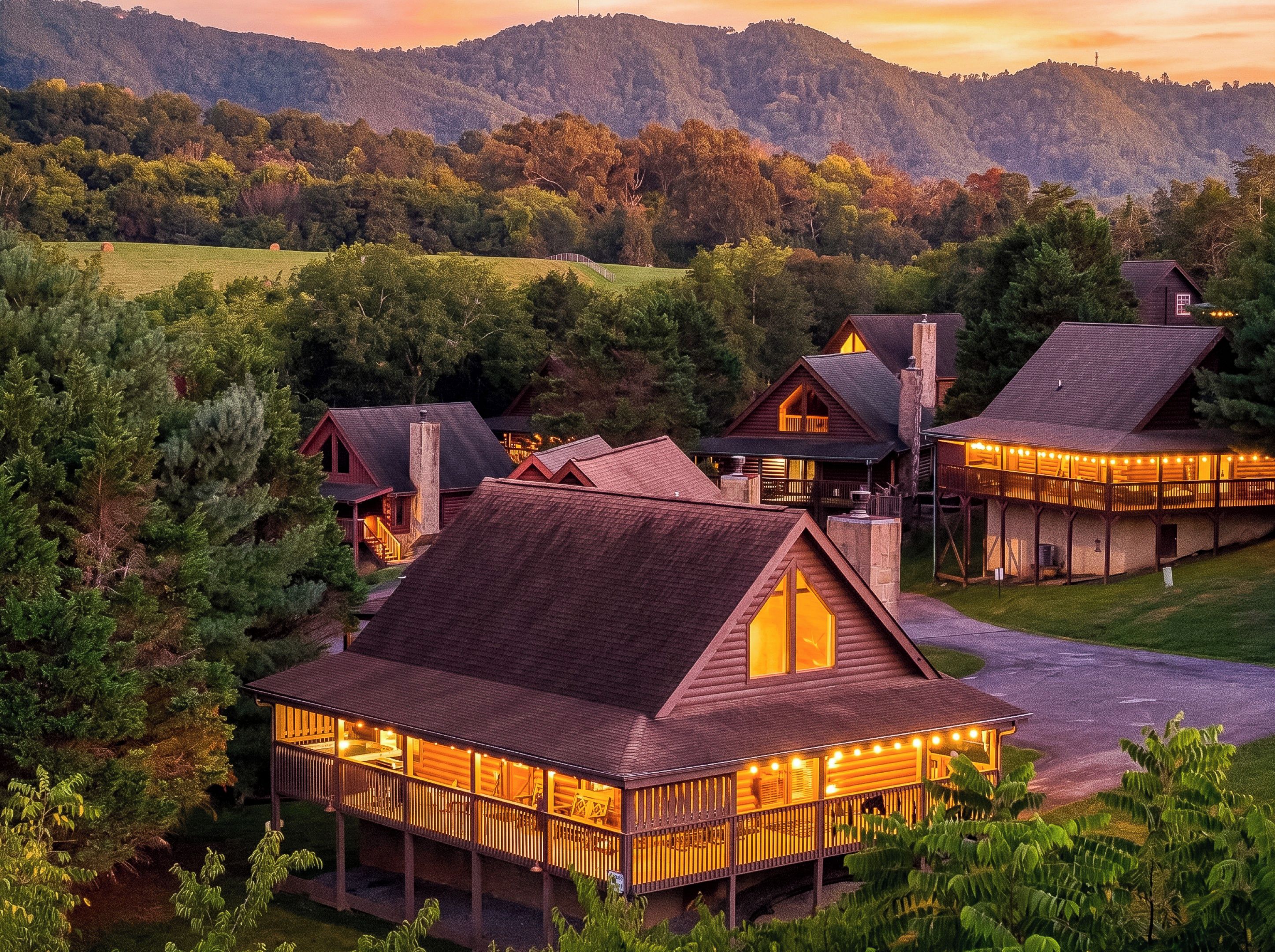 A lodge with multiple cabins, each featuring a prominent chimney and a porch area.