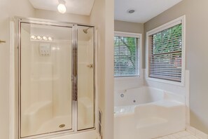 Bathtub, hair dryer, towels, soap