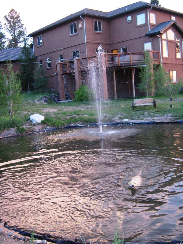 A building with a water fountain in front. - Serene Retreat Nestled in the pines- private & relaxing; Microweddings; Reunions (Colorado Springs)