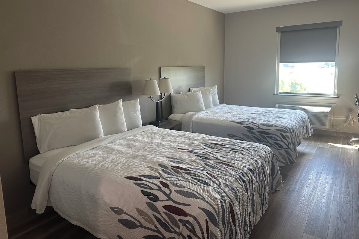 Deluxe Room, 2 Queen Beds, Non Smoking | Desk, laptop workspace, blackout curtains, rollaway beds