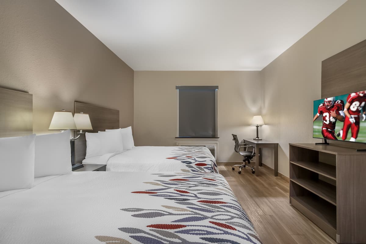 Deluxe Room, 2 Queen Beds, Non Smoking | Desk, laptop workspace, blackout drapes, rollaway beds