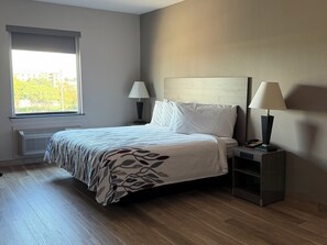 Desk, laptop workspace, blackout curtains, rollaway beds
