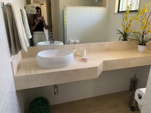 Shower, hair dryer, towels, soap
