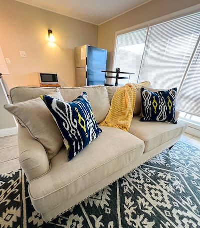 Smart TV, books. Capital City Condo #8