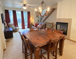 Dining area connected to living room and kitchen 