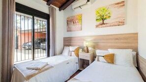 3 quartos, ferros/tábuas de passar roupa, berço de viagem, Wi-Fi