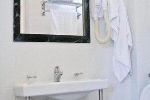 Free toiletries, hair dryer, towels, toilet paper