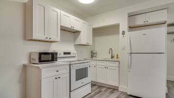 Fridge, microwave, stovetop, coffee/tea maker