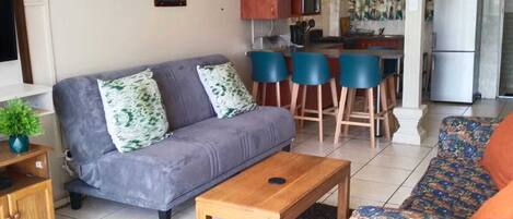 Full-size fridge, oven, stovetop, cookware/dishes/utensils