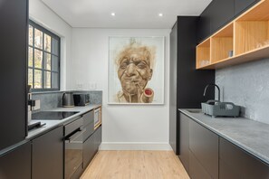 Standard Apartment | Private kitchen | Full-sized fridge, microwave, oven, stovetop - Modern Apartment in De Waterkant | Private Rooftop (Cape Town)