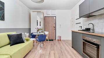 Appartement, 1 chambre, balcon | Salle de séjour