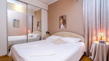 Apartamento (Three-Bedroom Apartment) | 3 quartos, Wi-Fi de cortesia, roupa de cama