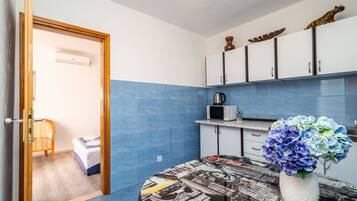 Apartment (One Bedroom Apartment) | Private kitchen | Fridge