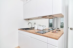 Apartment, 1 Bedroom, Balcony | Private kitchen | Microwave, dishwasher, coffee/tea maker, electric kettle - Apartment Wroclaw Pulaskiego (Wroclaw)