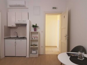 Studio (Studio Apartment 2) | Private kitchen | Fridge, electric kettle, cookware/dishes/utensils